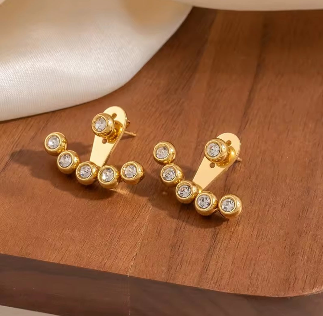 Aretes doble uso con circones